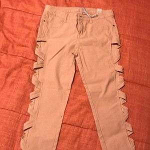 Fabric stretch pants open on each side